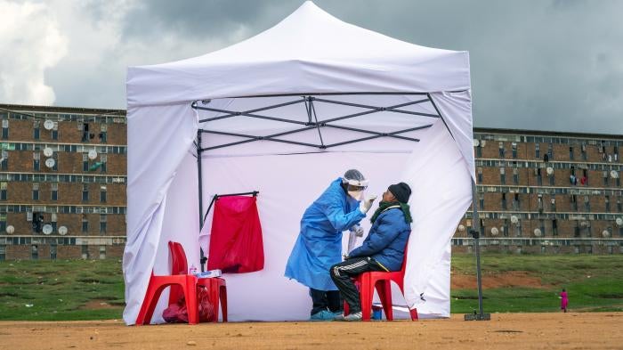 A resident from the Alexandra township gets tested for COVID-19 in Johannesburg, South Africa, April 29, 2020.