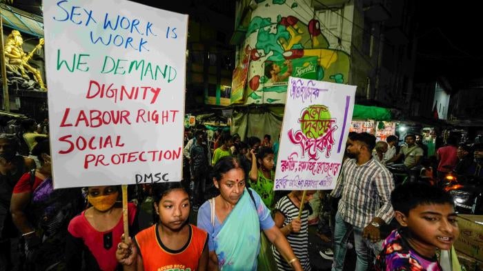 Sex workers and allies at a rally demanding sex work be recognized as work
