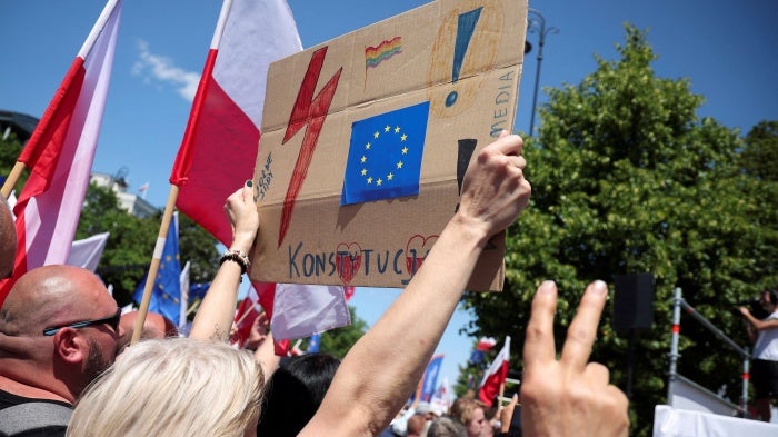 People take part in a march on the 34th anniversary of the first democratic elections in postwar Poland, in Warsaw, Poland, June 4, 2023. 