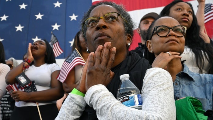 Supporters listen as Vice President Kamala Harris concedes the election
