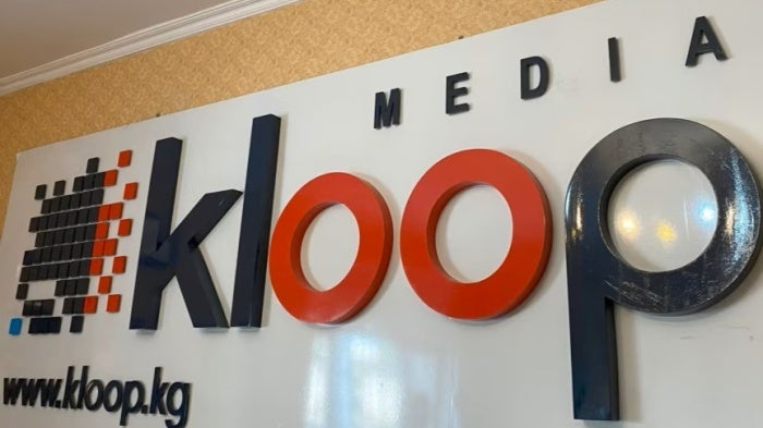 Kloop Media sign in the office of Kloop Media Public Foundation. 