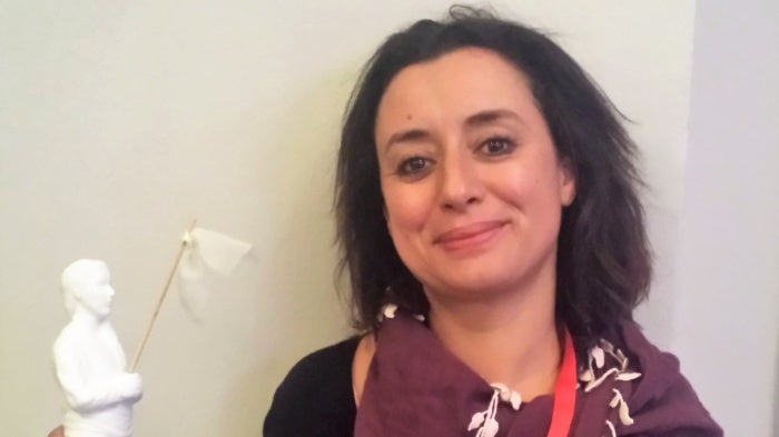  Ibtissame Lachgar holding her One Law For All award at the Secular Conference.