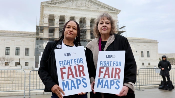 (L-R) Kesha Moore and Anne Houghtaling call on the US Supreme Court to uphold a fair and representative congressional map in Louisiana v. Callais on March 24, 2025 in Washington, DC. 