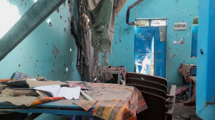 A desk bearing signs of shelling in a school where displaced people were sheltering, in El Fasher, Sudan, October 7, 2025. 