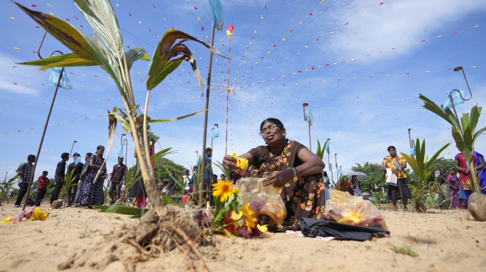Families mourn victims of Sri Lanka’s 1983-2009 civil war on the beach at Mullivaikal where the final battle took place, May 17, 2024. 