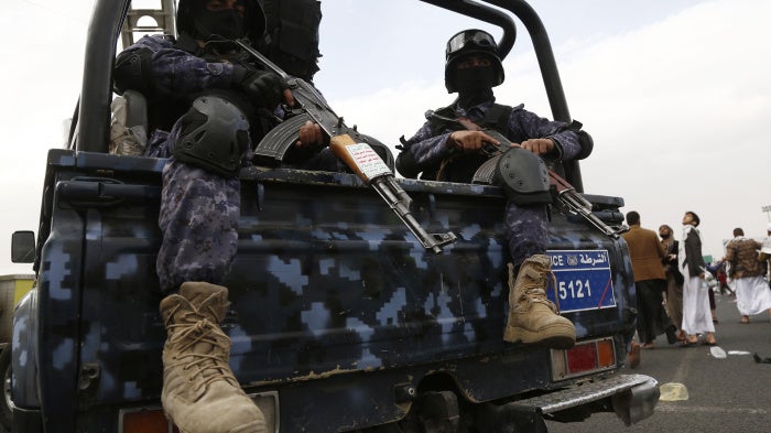Houthi police soldiers patrol during a protest in Sana'a, Yemen, on February 16, 2024. 