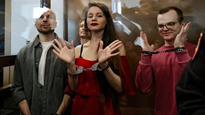 Journalists Sergei Karelin, Konstantin Gabov, Antonina Favorskaya and Artem Kriger, accused of taking part in the activities of an "extremist" organization founded by late opposition politician Alexei Navalny, attend a court hearing in Moscow, Russia, April 15, 2025.