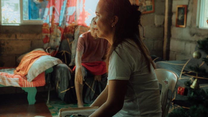 Mirasol at home in the No Build Zone with her husband in Del Carmen, Siargao, Philippines, 2025.