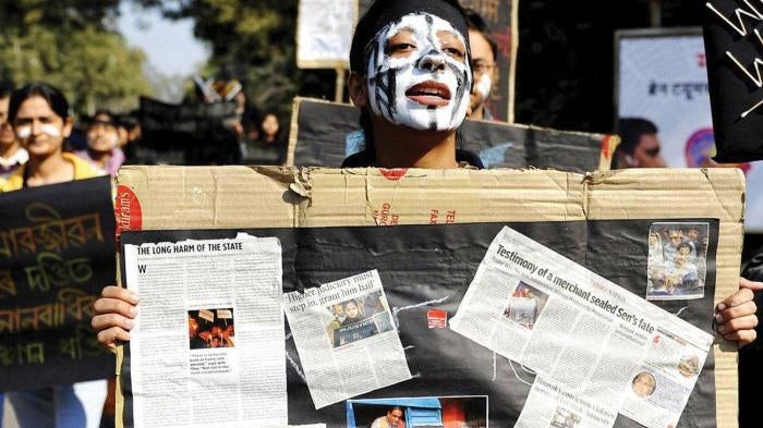 Students protest arrests of civil society activists in Delhi in January 2011.