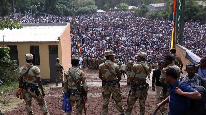 Armed security forces watch during the Irreecha cultural festival in Bishoftu, Ethiopia on October 2, 2016. 
