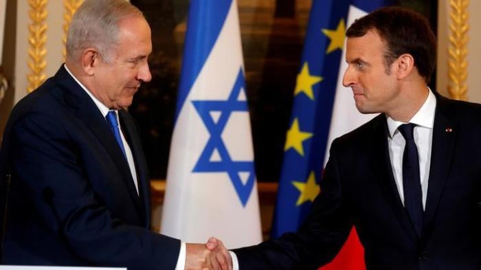 French President Emmanuel Macron and Israeli Prime Minister Benjamin Netanyahu attend a joint news conference at the Elysee Palace in Paris, France December 10, 2017. © 2017 Reuters 