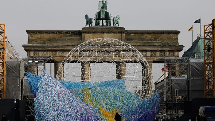 Workers prepare an art installation in front of the Brandenburg Gate in Berlin, Germany, November 1, 2019, to mark the 30th anniversary of the fall of the Berlin Wall.