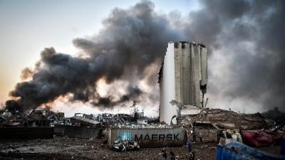 Smoke rising over the site of an explosion