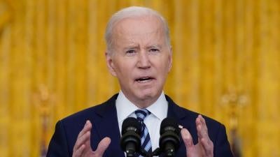 US President Joe Biden speaks in the East Room of the White House in Washington, February 24, 2022.