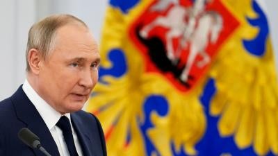 Russian President Vladimir Putin delivers a speech