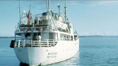An archival photo of a boat at sea