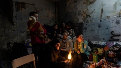 A family shelters from attacks