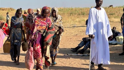 Displaced Sudanese people who fled El-Fasher after the city fell to the Rapid Support Forces (RSF) arrive in the town of Tawila, North Darfur, Sudan, on October 28, 2025.