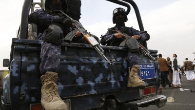Houthi police soldiers patrol during a protest in Sana'a, Yemen, on February 16, 2024. 