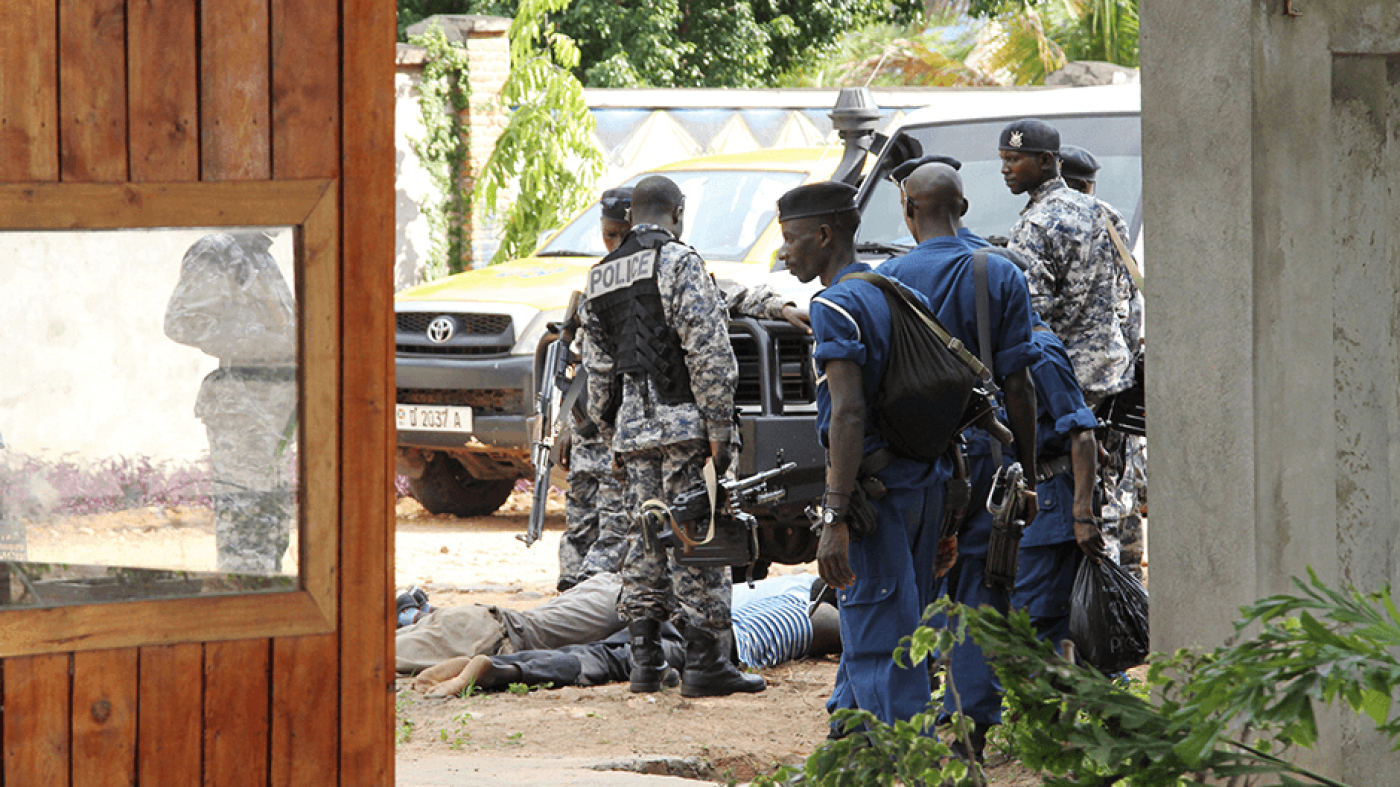 Burundian police hold suspects after discovering an alleged ammunition cache near Bujumbura, December 9, 2015.  