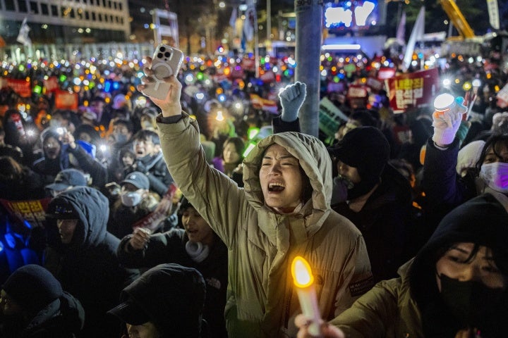 Protesters demonstrate against South Korea’s president outside the National Assembly in Seoul, which forced him to reverse martial law, December 7, 2024. 