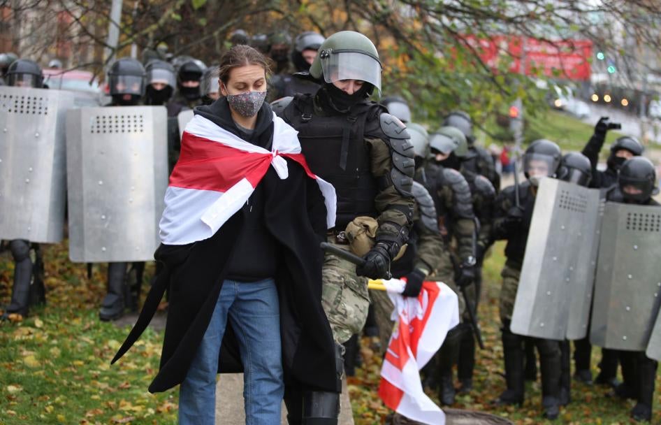 Police detain a protestor during an opposition rally to protest the official presidential election results in Minsk, Belarus, November 8, 2020.