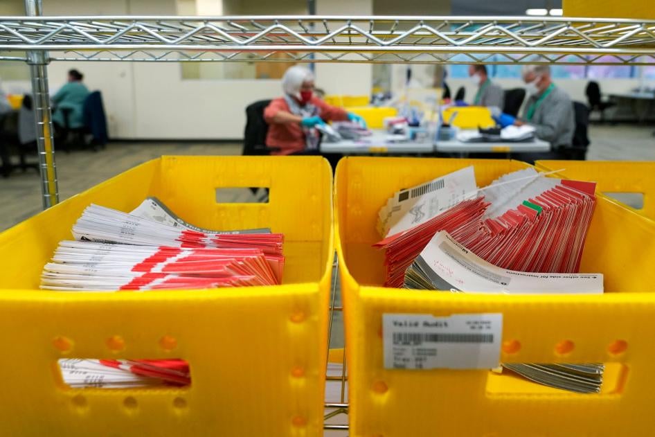 Boxes of vote-by-mail ballot envelopes are shown at the King County election headquarters in Renton, Washington, October 23, 2020. 