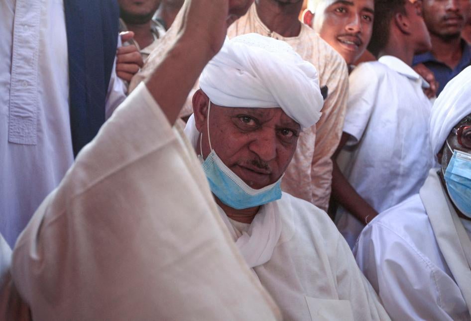 Sudanese Janjaweed militia chief Musa Hilal waves following his release in the Maamoura suburb of the capital Khartoum, Sudan, March 11, 2021. 