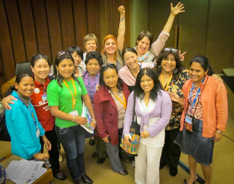 Domestic workers celebrate the adoption of the International Labour Organization Domestic Workers Convention in Geneva