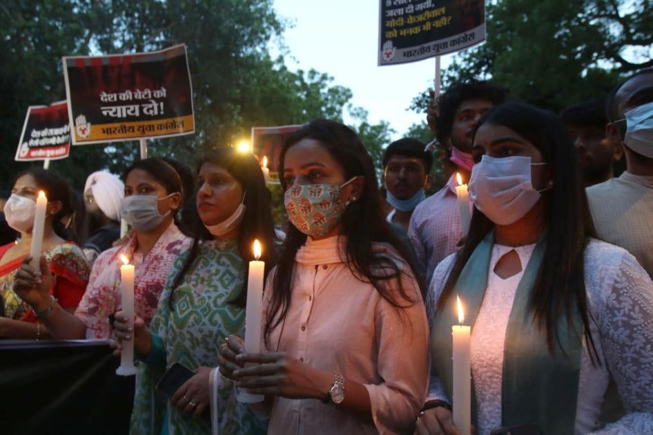 Activists hold a candlelight march protesting the alleged rape and murder of a 9-year-old Dalit girl in New Delhi, India on August 4, 2021. 