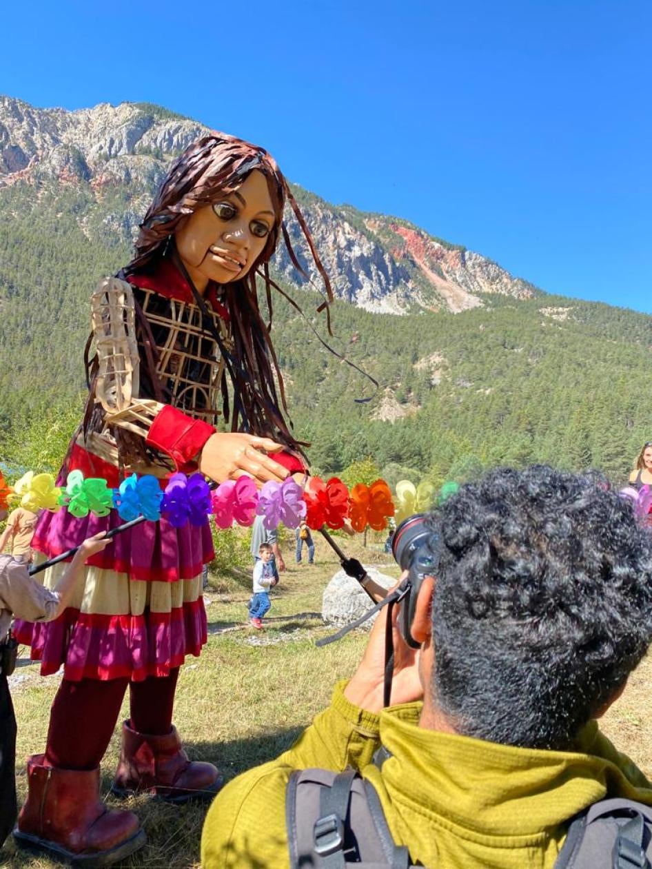 Abdul Saboor photographs Little Amal, a giant puppet trekking from the Syria-Turkey border to Manchester.