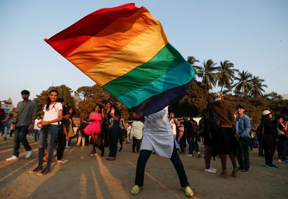 A participant waves a flag during Queer Azadi Pride, an event promoting gay, lesbian, bisexual and transgender rights, in Mumbai, India on February 1, 2020.