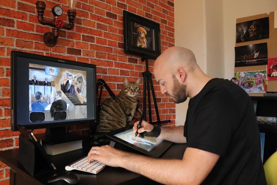 A man working at a computer desk