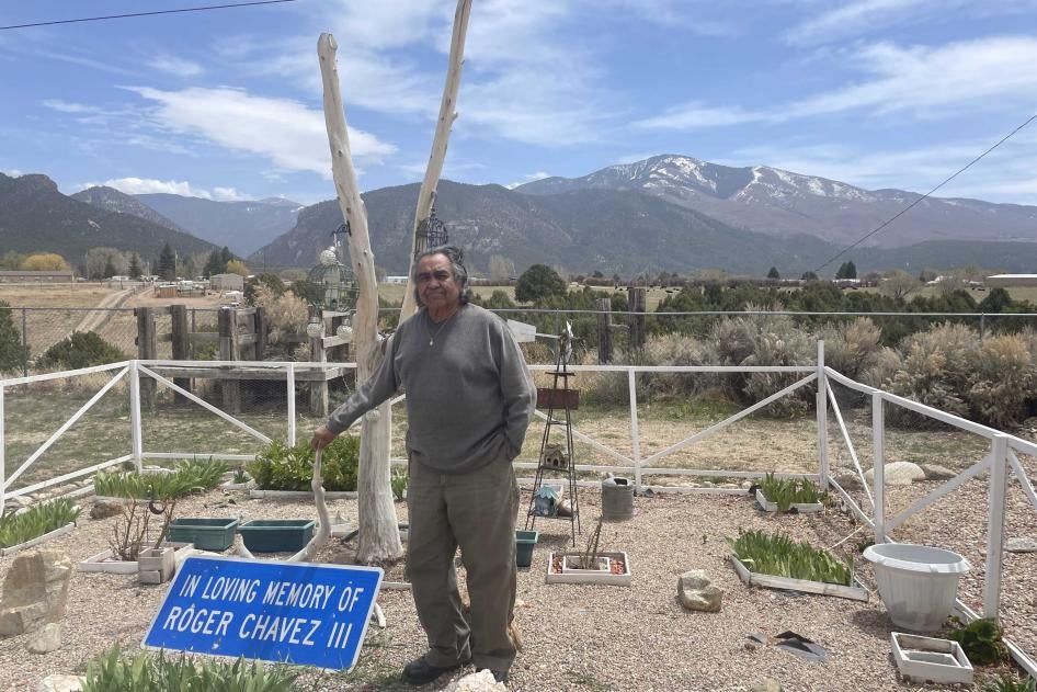 A man stands in a garden