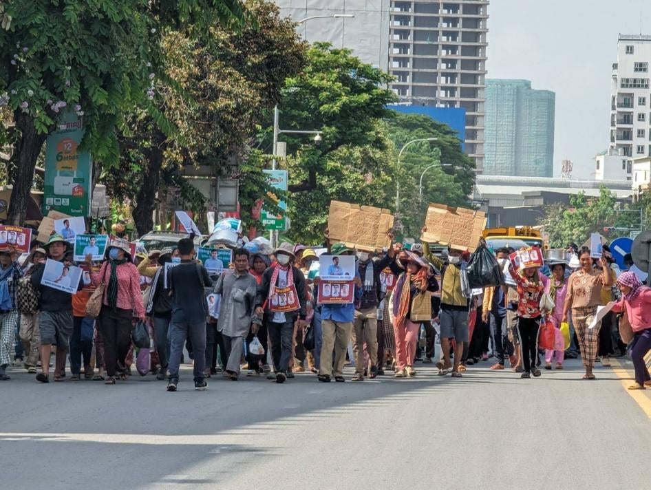 Coalition of Cambodian Farmer Community (CCFC) supporters march to the Ministry of Interior in Phnom Penh on May 22, 2023, to demand the release of three of their members charged with plotting and incitement. 