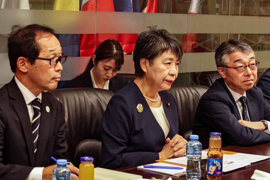 Japan's Foreign Minister Yoko Kamikawa (C) and her delegation met with both the Israeli Foreign Minister in Tel Aviv and later the Palestinian Foreign Minister in the occupied West Bank on November 3, 2023. 
