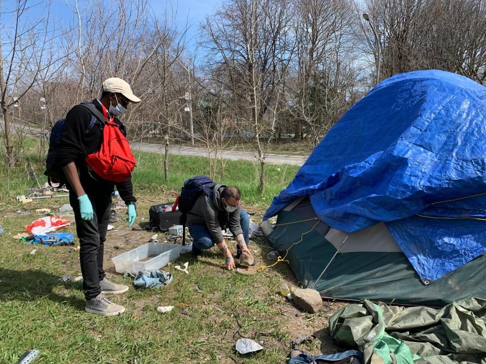 A Gerstein Crisis Centre Mobile Team paying a visit to an encampment for people without homes