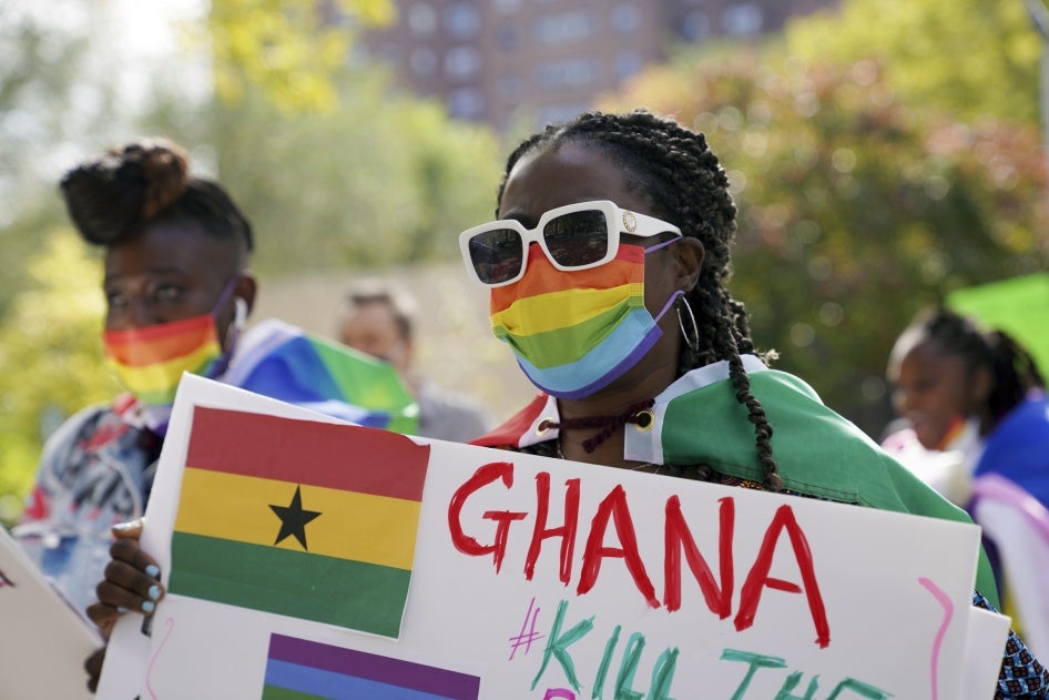 A demonstrator attends a rally against a controversial bill being proposed in Ghana's parliament that would make identifying as LGBTQIA or an ally a criminal offense punishable by up to 10 years in prison, Harlem, New York, October 11, 2021. 