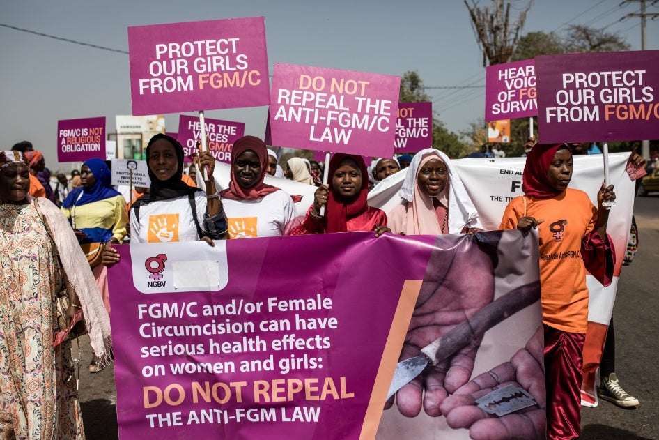 Protesters against female genital mutilation (FGM) demonstrate outside the National Assembly in Banjul, Gambia, on March 18, 2024. 