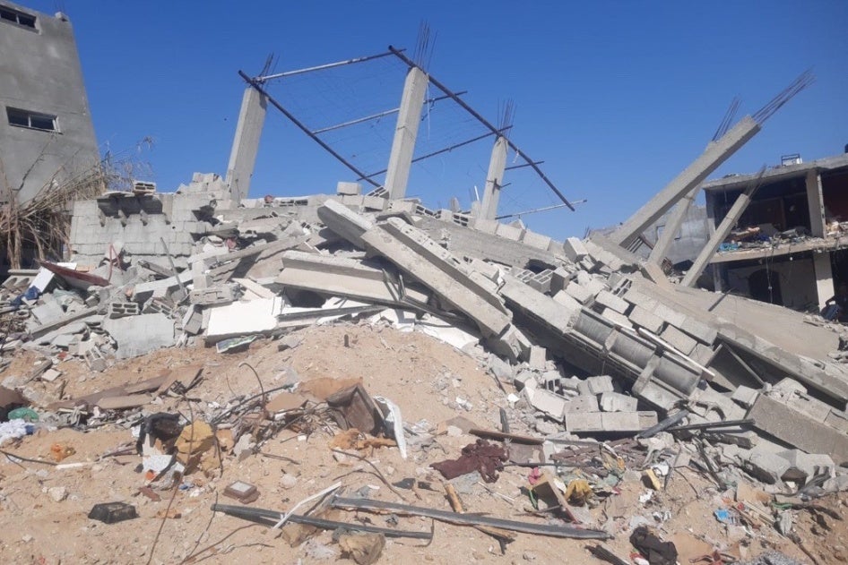Photo showing a house reduced to rubble
