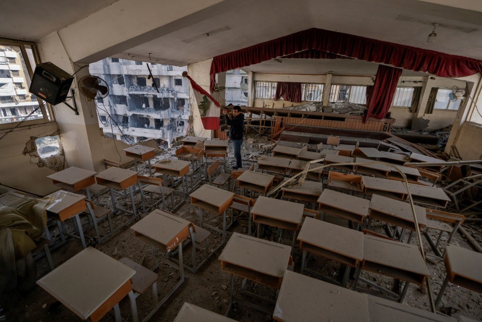 Teacher Ahmed Awada inspects his school that was damaged by an Israeli airstrike in Dahiyeh, Beirut, Lebanon, November 29, 2024