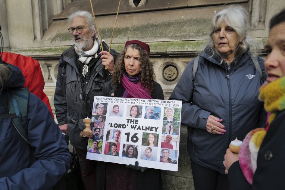 Supporters of Just Stop Oil, Defend Our Juries and other groups gather outside the Royal Courts of Justice in London to protest during the appeal hearing for 16 activists who are collectively serving 41 years in prison for peaceful resistance, January 29, 2025.