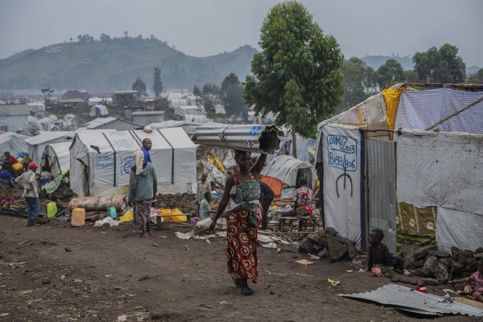 People displaced by the fighting between the M23 armed group and Congolese government forces leave their camp after the M23 ordered their displacement, Goma, Democratic Republic of Congo, February 11, 2025.