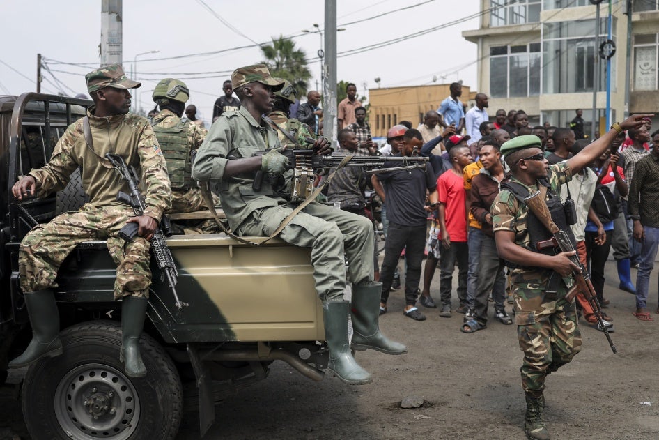 Members of the Rwandan-backed M23 armed group in a vehicle.