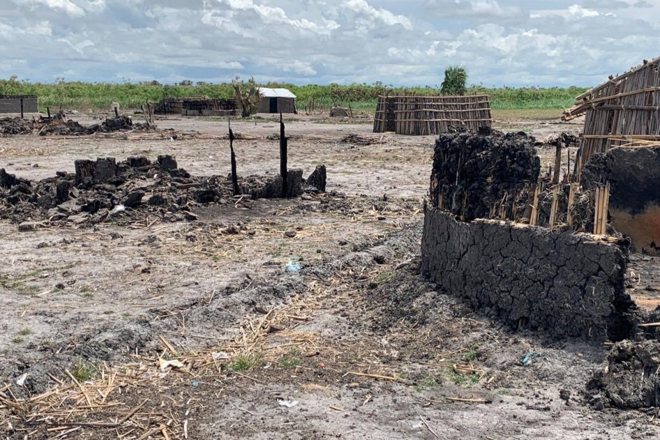 The remains of burnt homes in the town of Adok in Leer county, South Sudan. Photo taken in May 2022.