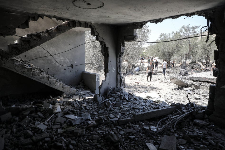 Palestinians inspect a house demolished by Israeli military forces in the town of Qabatiya in the Israeli occupied West Bank, July 17, 2025. 