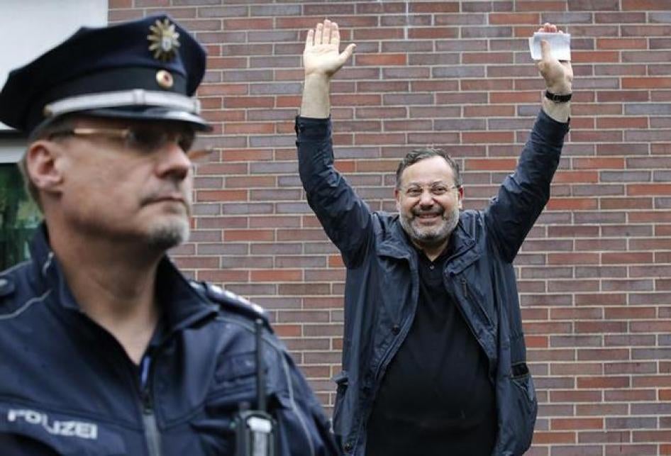Al Jazeera's journalist Ahmed Mansour gestures as he arrives for a news conference in Berlin, Germany on June 23, 2015. 