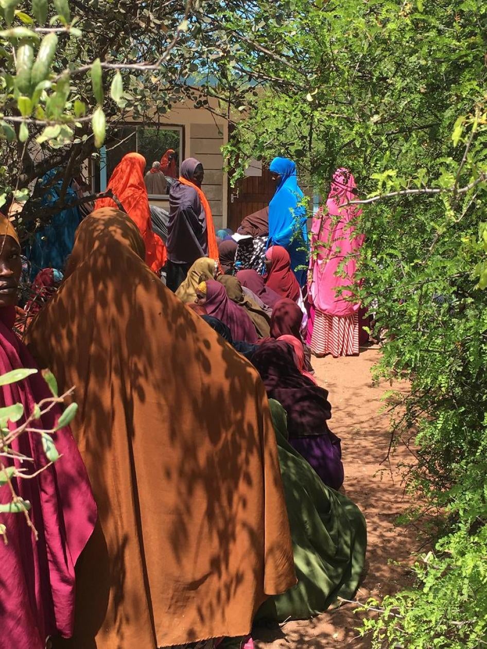 Photo: Somali refugees queuing inside the UNHCR Hagadera center waiting to access the helpdesk room to be registered to return to Somalia. 