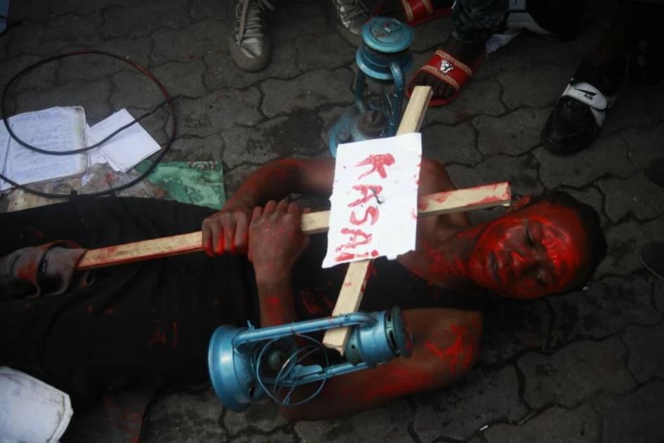 An artist protests the killings across the Democratic Republic of Congo’s central Kasai region, in the eastern city of Goma, June 23, 2017. Four artists were arrested, and released after five days. 