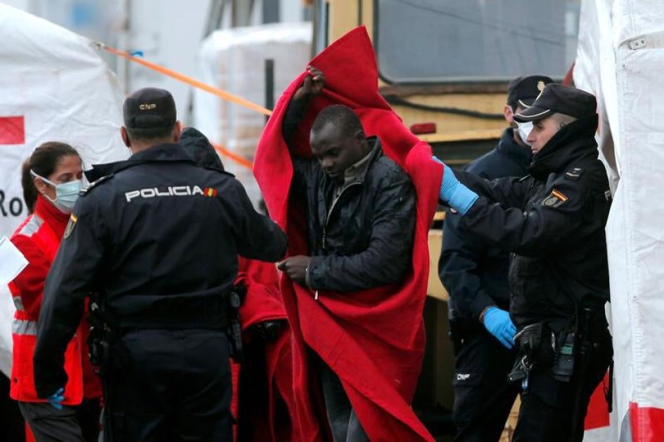 A migrant rescued off the Spanish coast arriving at the port in Malaga, southern Spain, December 3, 2016.
